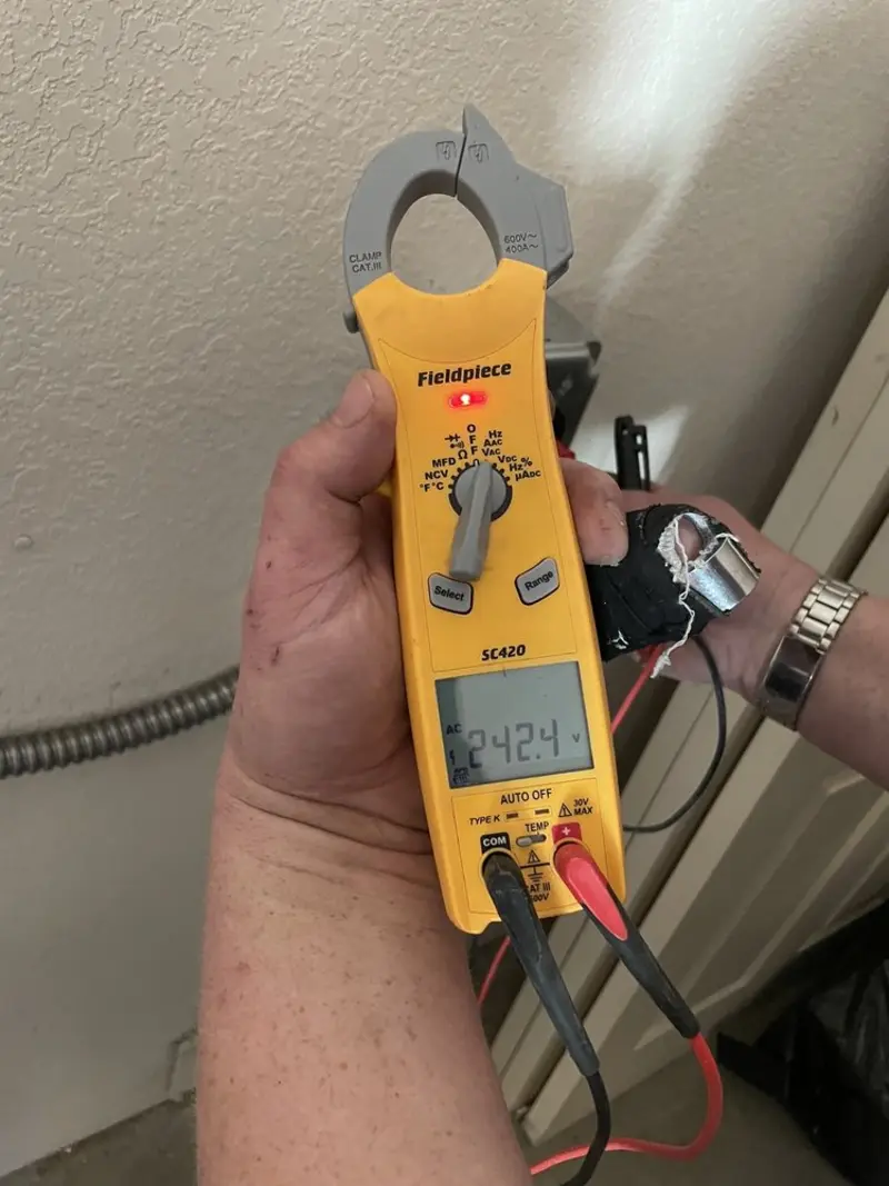 Voltage testing with clamp meter during Outlet Installation in Cohoes